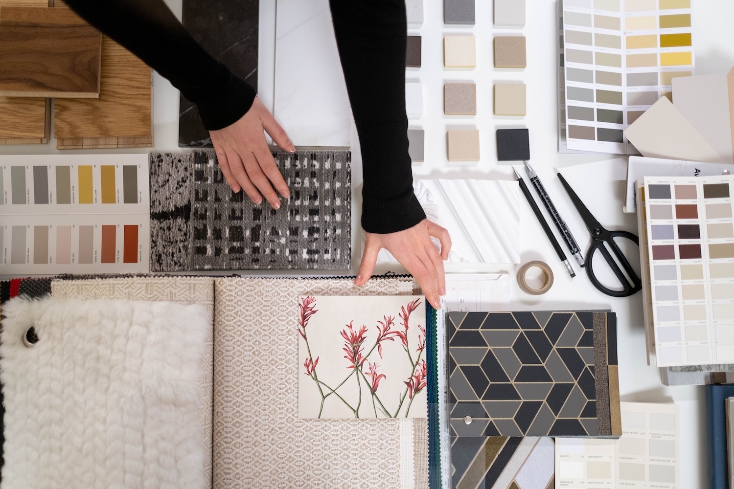 Creative mood board with color palettes, materials, and design samples used in the branding process.